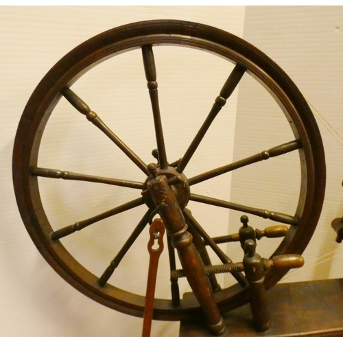 94 - Fruitwood spinning wheel in the 17th century style, 100cm high and approximately 105cm wide.Prov: Sh... 