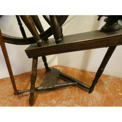 94 - Fruitwood spinning wheel in the 17th century style, 100cm high and approximately 105cm wide.Prov: Sh... 