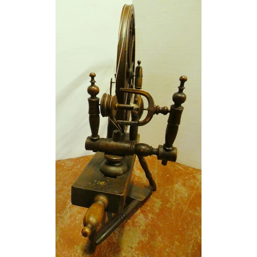 94 - Fruitwood spinning wheel in the 17th century style, 100cm high and approximately 105cm wide.Prov: Sh... 