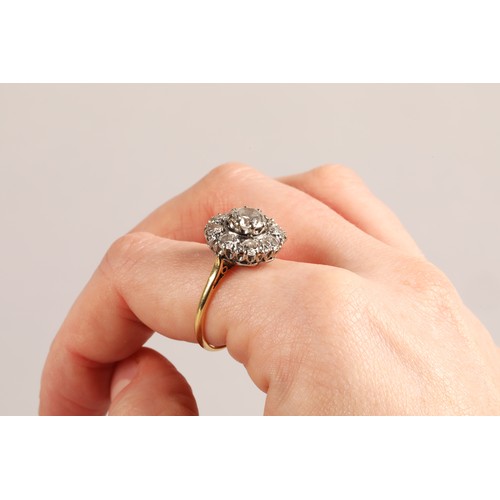 49 - Diamond cluster ring, central old cut 1 carat stone surrounded by eight 0.2 carat stones, mounted in... 