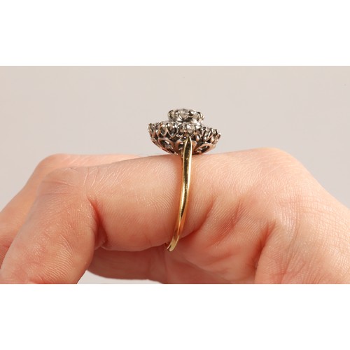 49 - Diamond cluster ring, central old cut 1 carat stone surrounded by eight 0.2 carat stones, mounted in... 