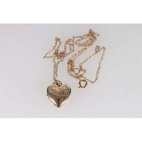 499 - 9ct gold heart shape pendant on 9ct gold fine chain, 3.8g.