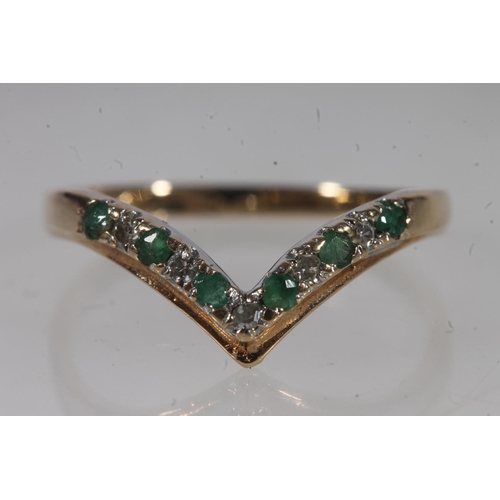 500 - 9ct gold emerald and diamond wishbone ring, 1.2g.