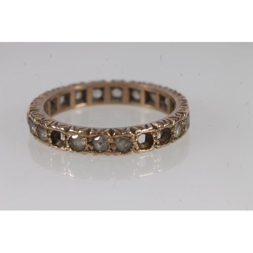 504 - 9ct gold and white stone eternity ring, 2.9g.