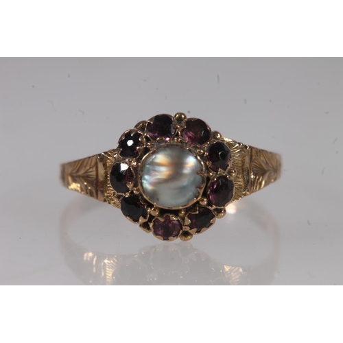 506 - Edwardian 9ct gold garnet and split pearl cluster ring, 1.4g.