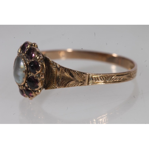 506 - Edwardian 9ct gold garnet and split pearl cluster ring, 1.4g.