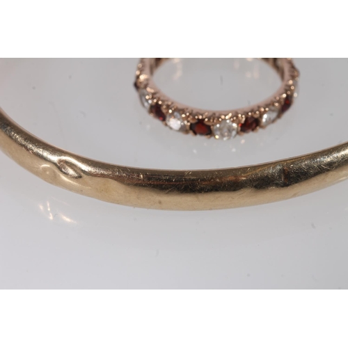 508 - Yellow metal bangle together with a yellow metal ring (2)