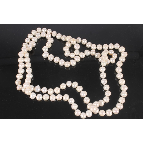 521 - Opera length Pearl bead necklace.