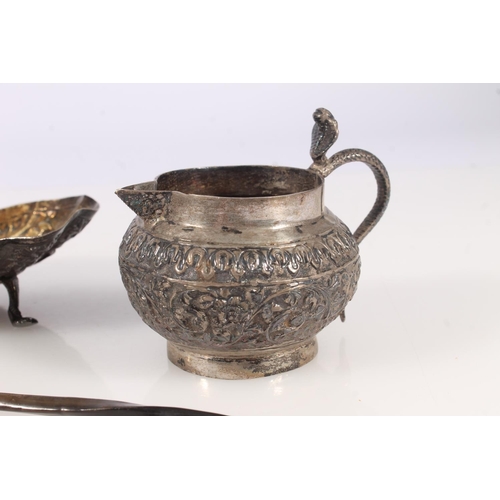 550 - Indian white metal jug, similar shell form bowl and a white metal toddy ladle with whalebone handle ... 