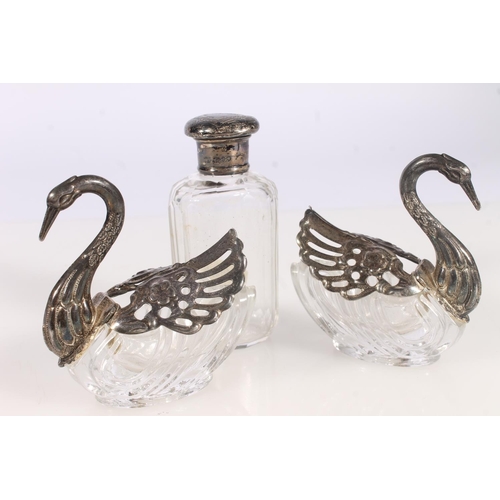 551 - Silver and glass perfume bottle, silver teaspoon and a pair of silver plated and glass Swan form sal... 