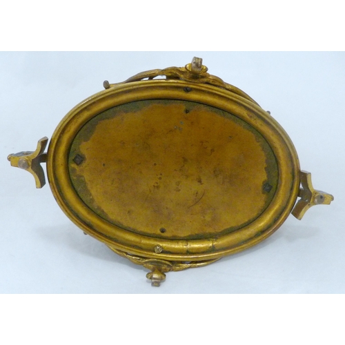 398 - French champlevé and gilt metal oval jewellery box, c. early 20th century, with bird surmount on stu... 