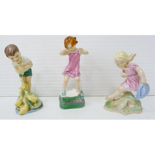 330 - Three Royal Worcester figures to include 'Wednesday's Child is Full of Woe', 15cm high, 'Johnnie' 34... 