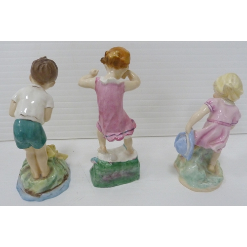 330 - Three Royal Worcester figures to include 'Wednesday's Child is Full of Woe', 15cm high, 'Johnnie' 34... 