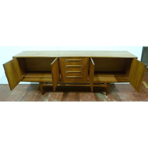 553 - In the Manner of Victor B Wilkins for G-PlanRetro teak sideboard of large proportions with four shor... 