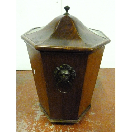 554 - Georgian mahogany cellarette of tapering octagonal form, the domed faceted cover with moulded edge, ... 