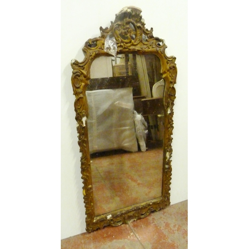 503 - Rococo-style giltwood and gesso wall mirror, 19th century, the frame with all over scrolls, plate gl... 