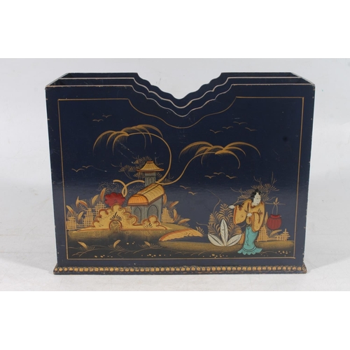 114 - Black lacquer letter rack decorated in gilt with chinoserie scene, H23cm.