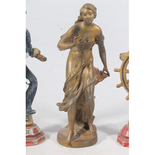 138 - Cast spelter Art Nouveau figure and a pair of Britains Pride naval fireside figures, H29cm.