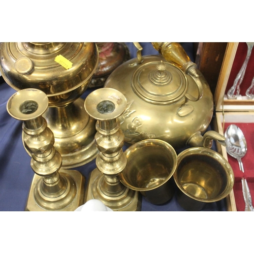 142 - Brass teapot, oil lamp, candlesticks and other metal ware (qty)