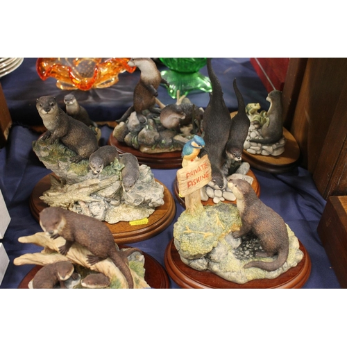 145 - Border Fine Arts otter and bird figures (qty)