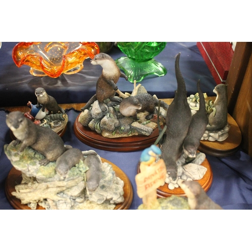 145 - Border Fine Arts otter and bird figures (qty)