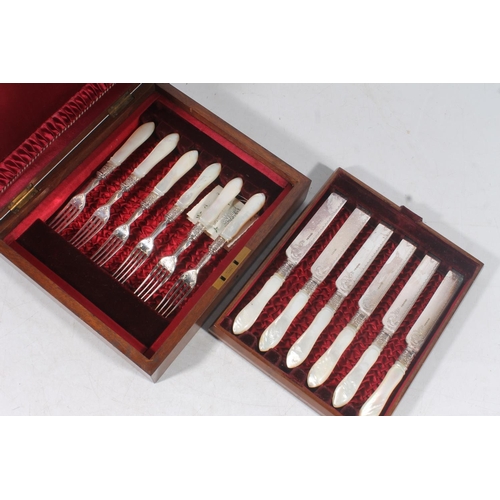 148 - Set of six late Victorian mother of pearl handled and silver plate knives and forks .