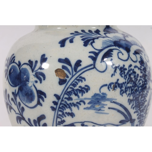 153 - 18th century tin glaze blue and white earthern ware baluster vase or albarello in the Dutch delft st... 