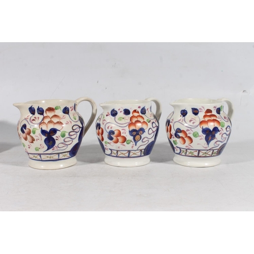 158 - Three Imari decorated jugs and a smilar bowl, also a soup plate.