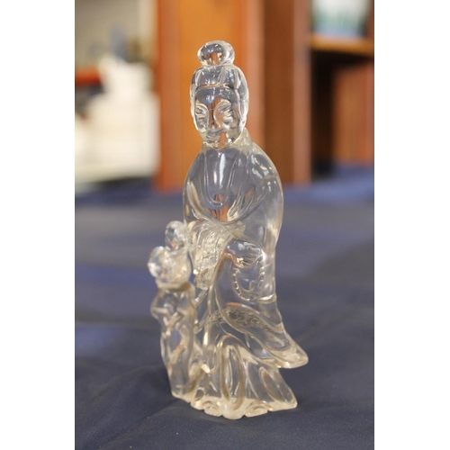 165 - Chinese carved rock crystal model of Guanyin, 13cm tall.