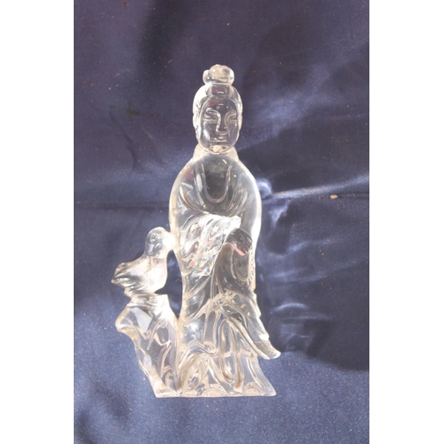 165 - Chinese carved rock crystal model of Guanyin, 13cm tall.