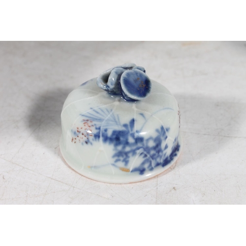 166 - Two Japanese style blue and white porcelain inkwells. (2)