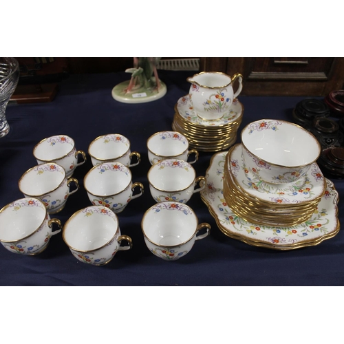 17 - Royal Albert teaset decorated with polychrome flowers.