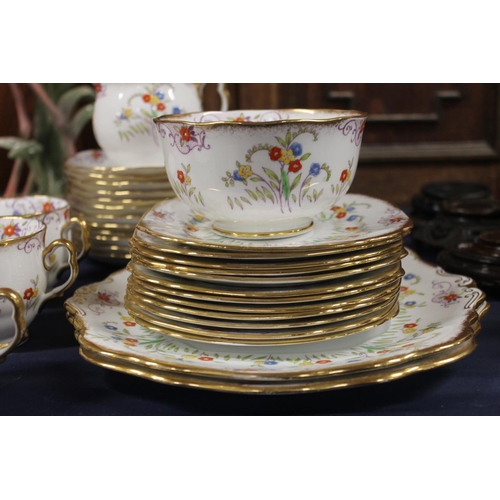 17 - Royal Albert teaset decorated with polychrome flowers.