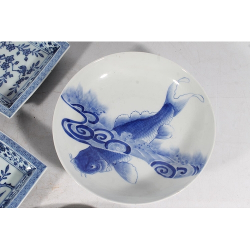 170 - Japanese porcelain dish decorated with fish, a set of four blue and white square dishes decorated wi... 