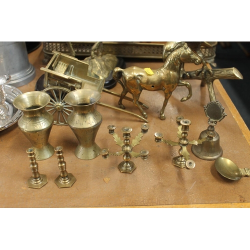 187 - Brass ornaments to include model of an eagle, horse and cart, Royal stag, etc. also a galleried tray... 