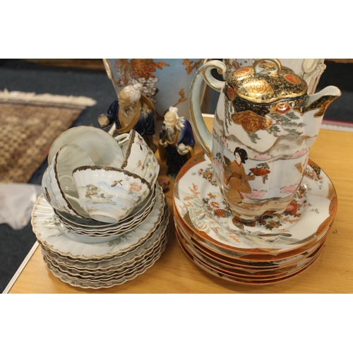 204 - Oriental ceramics to include Moriageware Satsuma vases, mud men figures, Japanese part tea set, Kuta... 