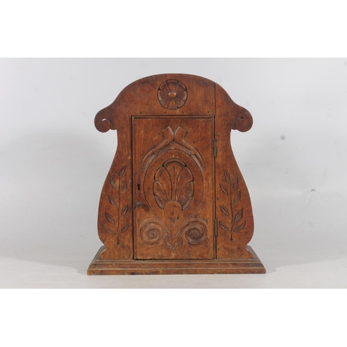 3 - Carved oak smokers cabinet, H38cm.