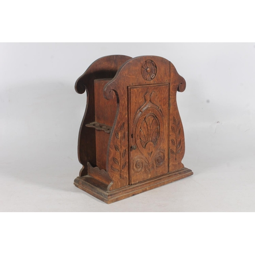 3 - Carved oak smokers cabinet, H38cm.