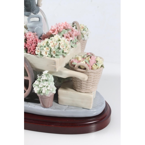 5 - Lladro Flowers of the Season porcelain figurine on wooden base model 1454.