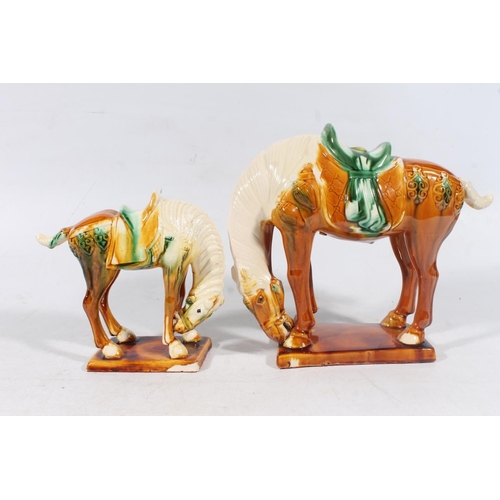 54 - Three Chinese Tang style pottery horses, max H24cm.