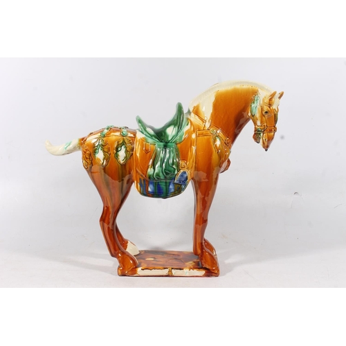 55 - Large Chinese Tang style pottery horse, H42cm.