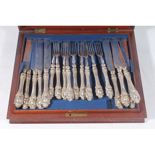 7 - Victorian silver plated canteen of starter forks and knives for twelve.