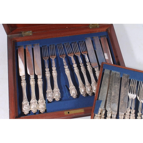 7 - Victorian silver plated canteen of starter forks and knives for twelve.