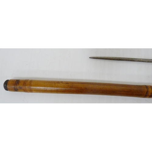 401 - Bamboo sword stick, c. early 20th century, with snakeskin-style handle, push button release to the s... 