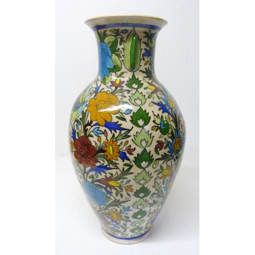 375 - Persian crackle glazed pottery vase of large baluster proportions, decorated with multi-coloured und... 