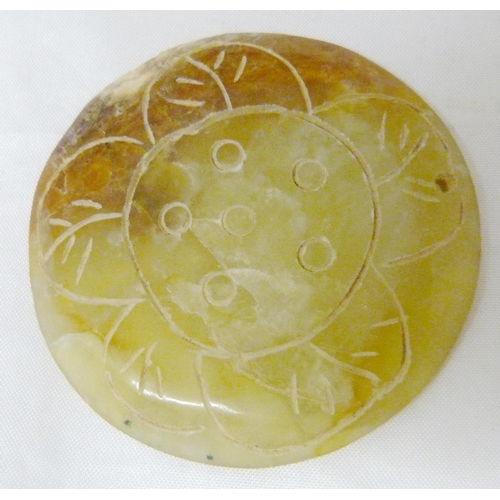 365 - Four Chinese-style jade-coloured pendants to include a disc and figure example, largest 6cm diameter... 