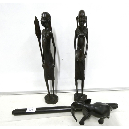 145 - Two carved African figures, elephant etc.