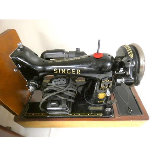 161 - Cased Singer sewing machine.