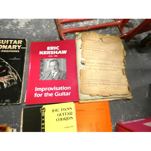 225 - Various classical records and guitar music books.