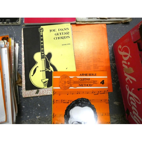 225 - Various classical records and guitar music books.